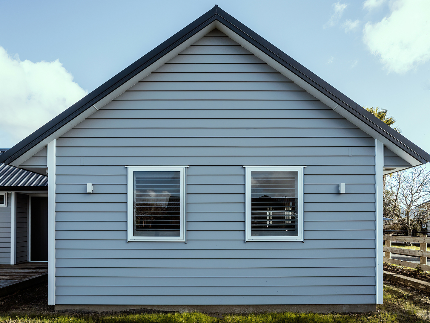 Freshly painted gable with timber cladding and white bargeboards
