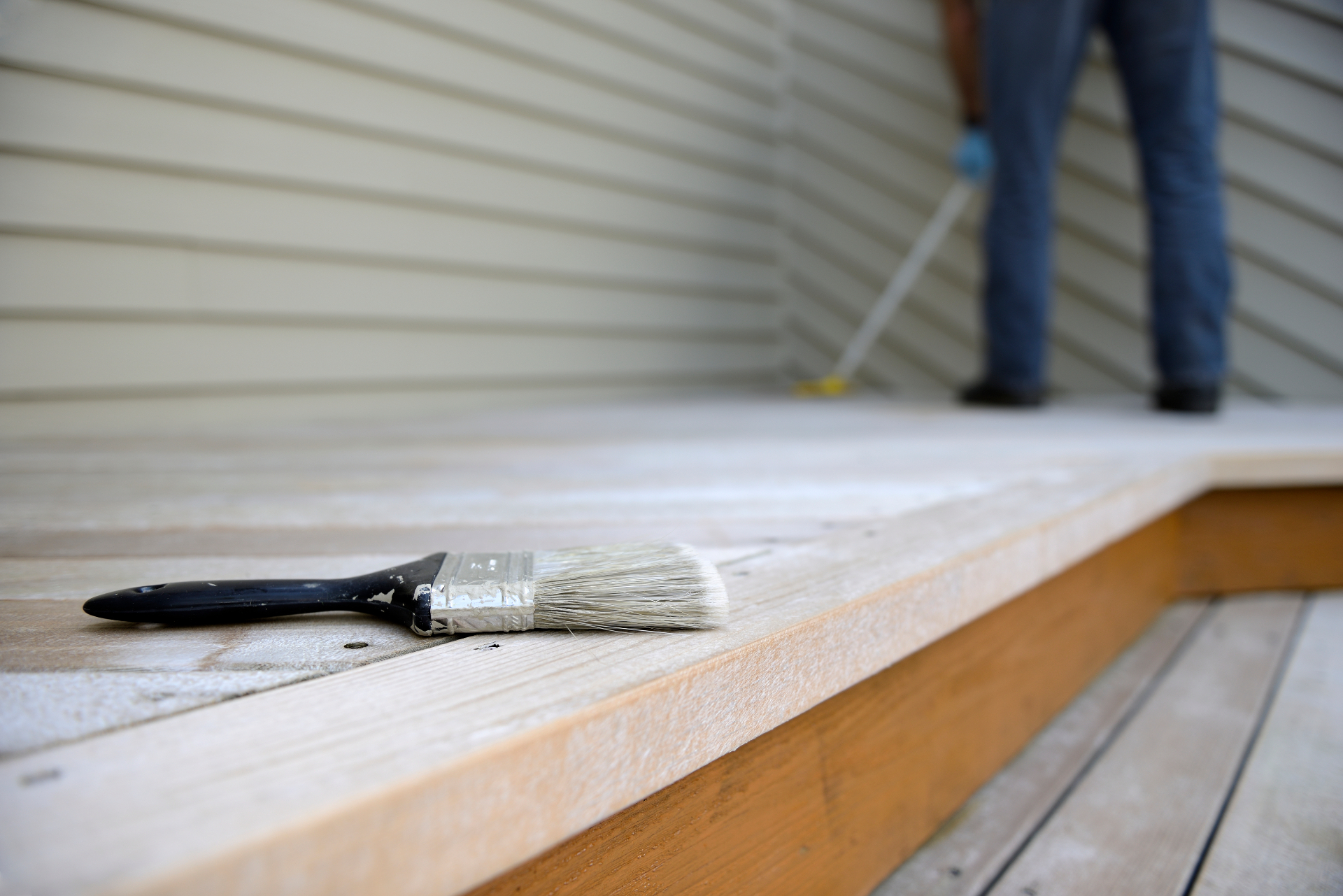 Preparation work: sanding and cleaning before painting exterior timber